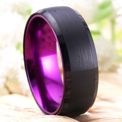 Black and purple engagement rings crafted with brushed black Tungsten and polished purple Tungsten.