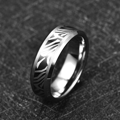 Black and silver zebra ring with a comfort fit interior and striking zebra pattern.