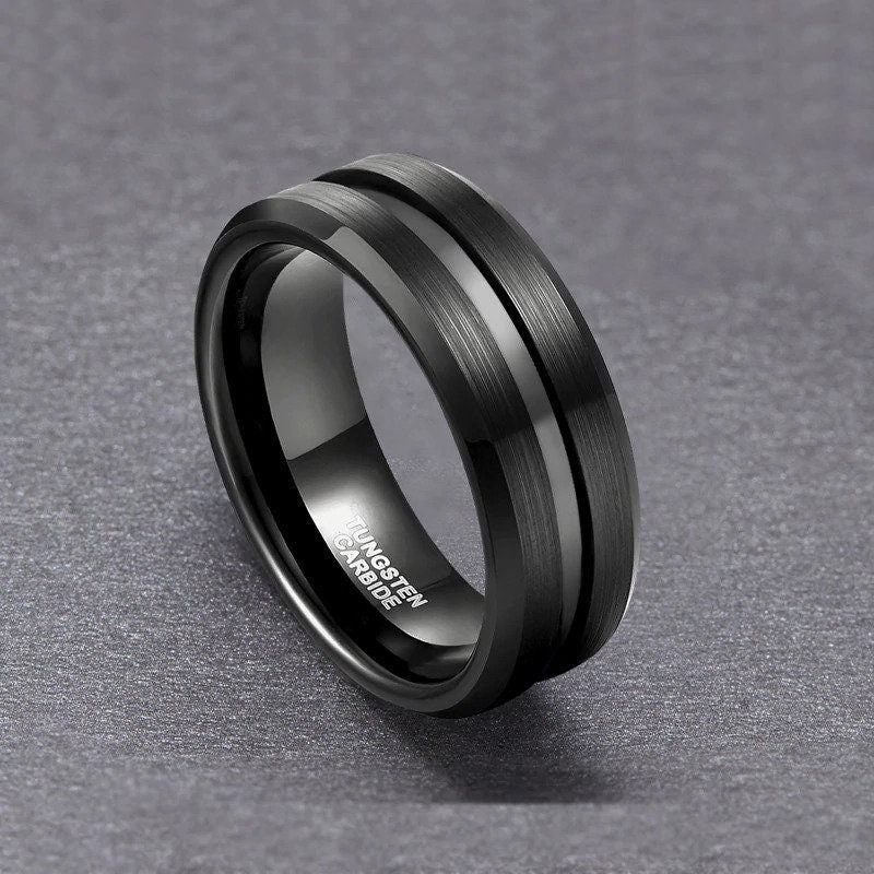 Black mens rings in Tungsten, featuring comfort fit and beveled edges.