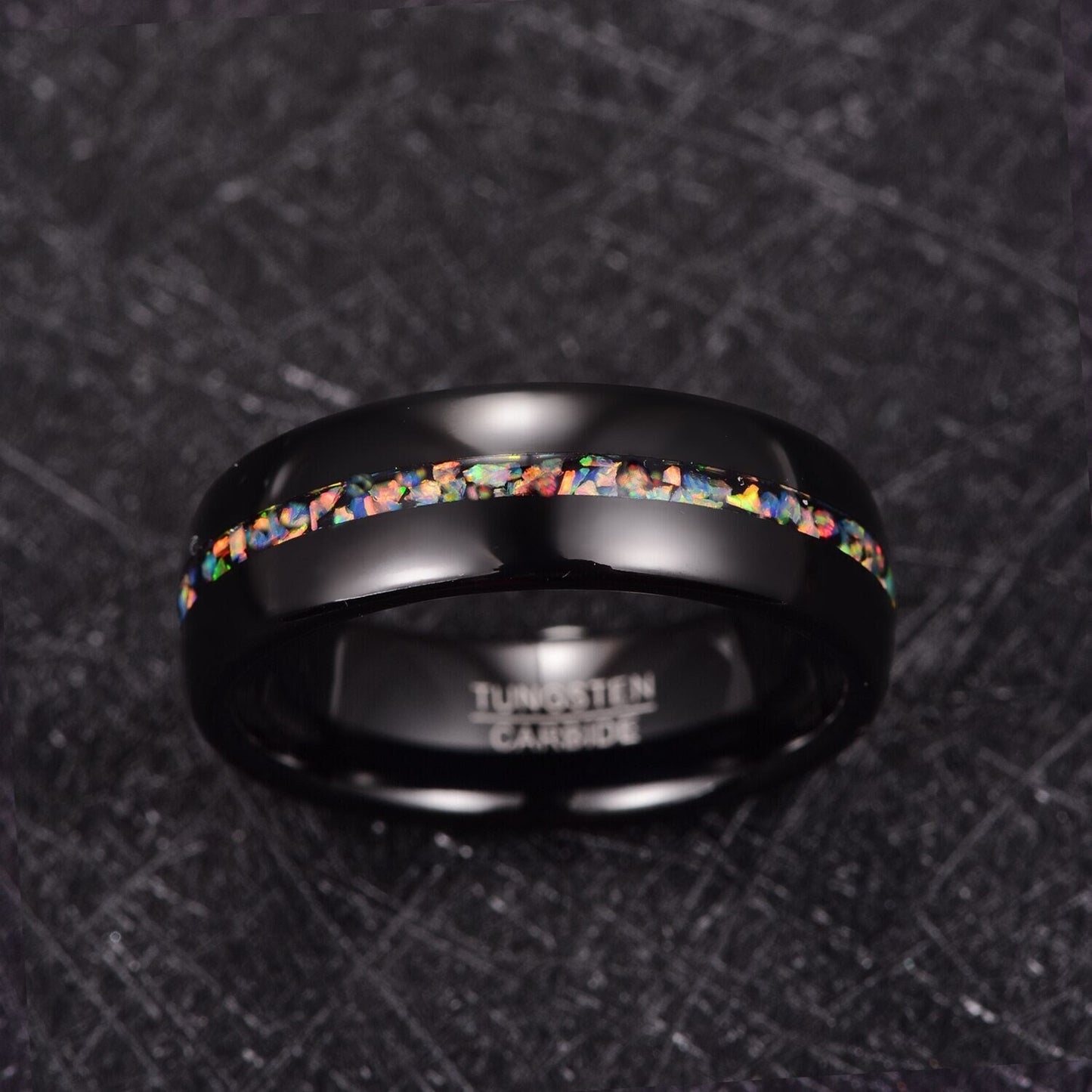 Black opal wedding rings in polished black Tungsten with a domed design and opal inlay.