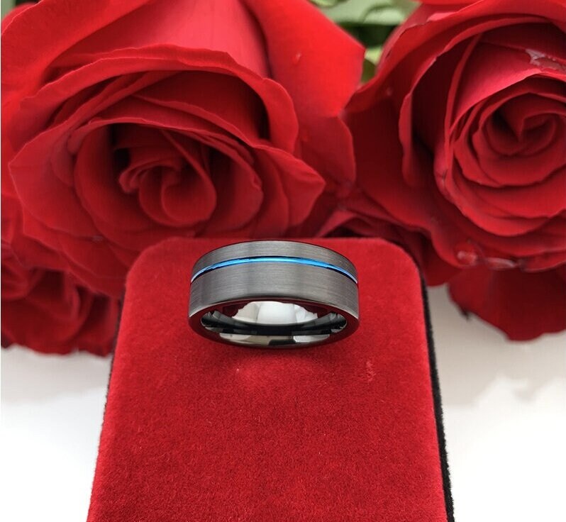 Black ring with blue stripe, brushed black Tungsten exterior, and polished comfort fit interior.