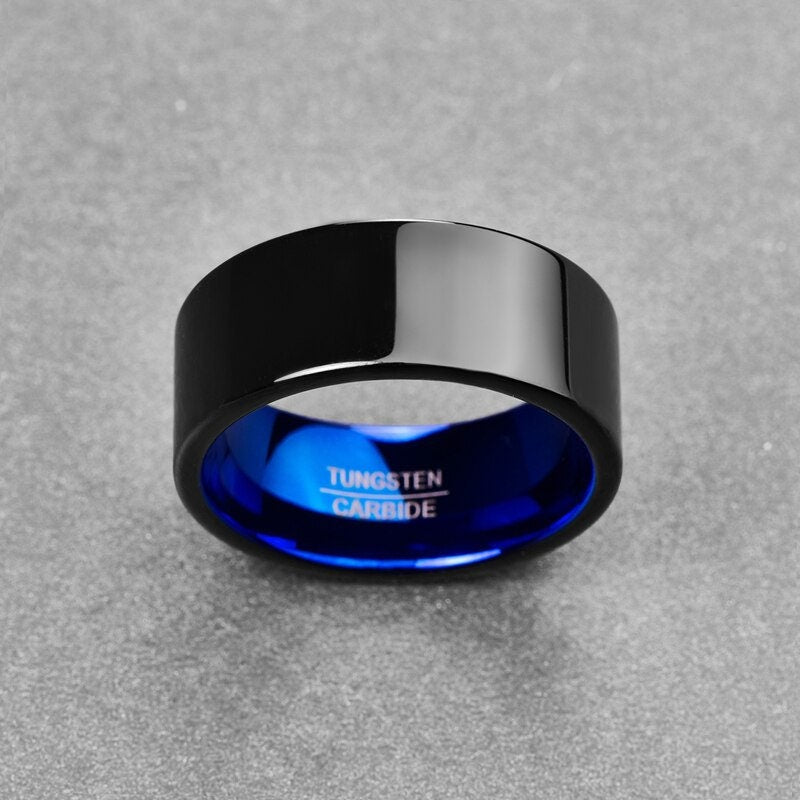 Black ring with bright blue interior and polished flat Tungsten band.