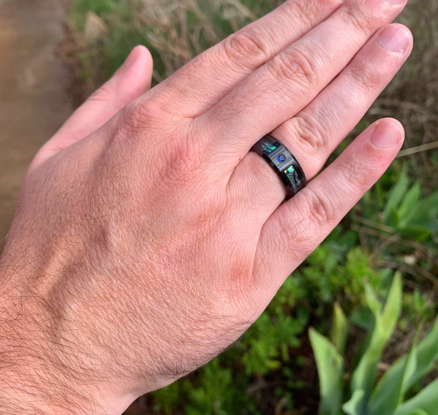 Black Tungsten abalone stone ring with a flat band, polished finish, and comfort fit interior for men.