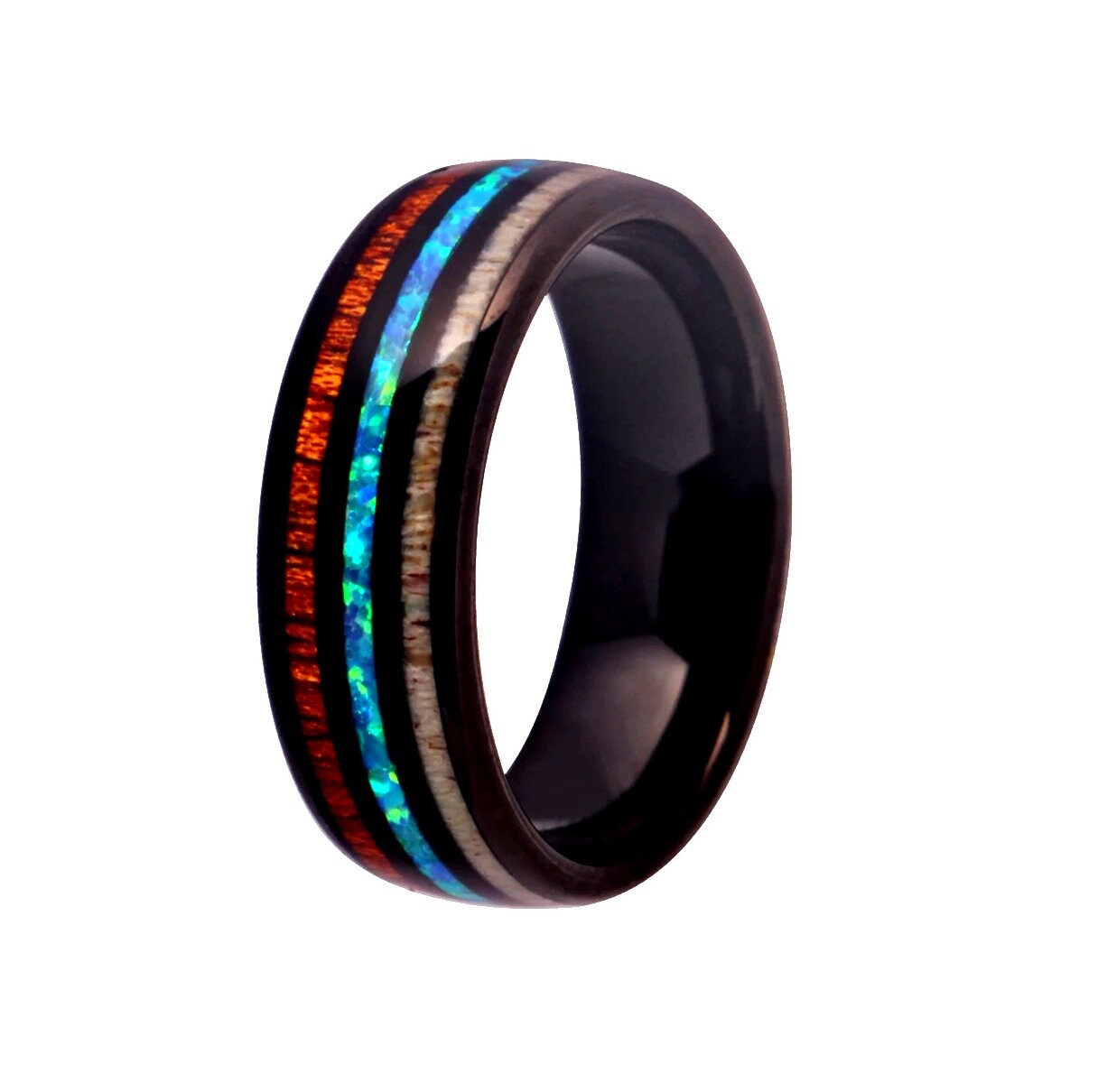 Black Tungsten antler wood opal ring featuring a domed band, comfort fit interior, and radiant inlays of Mahogany wood, opal, and deer antler.