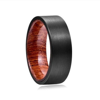 Black wood ring crafted from Tungsten with a polished Mahogany wood interior.