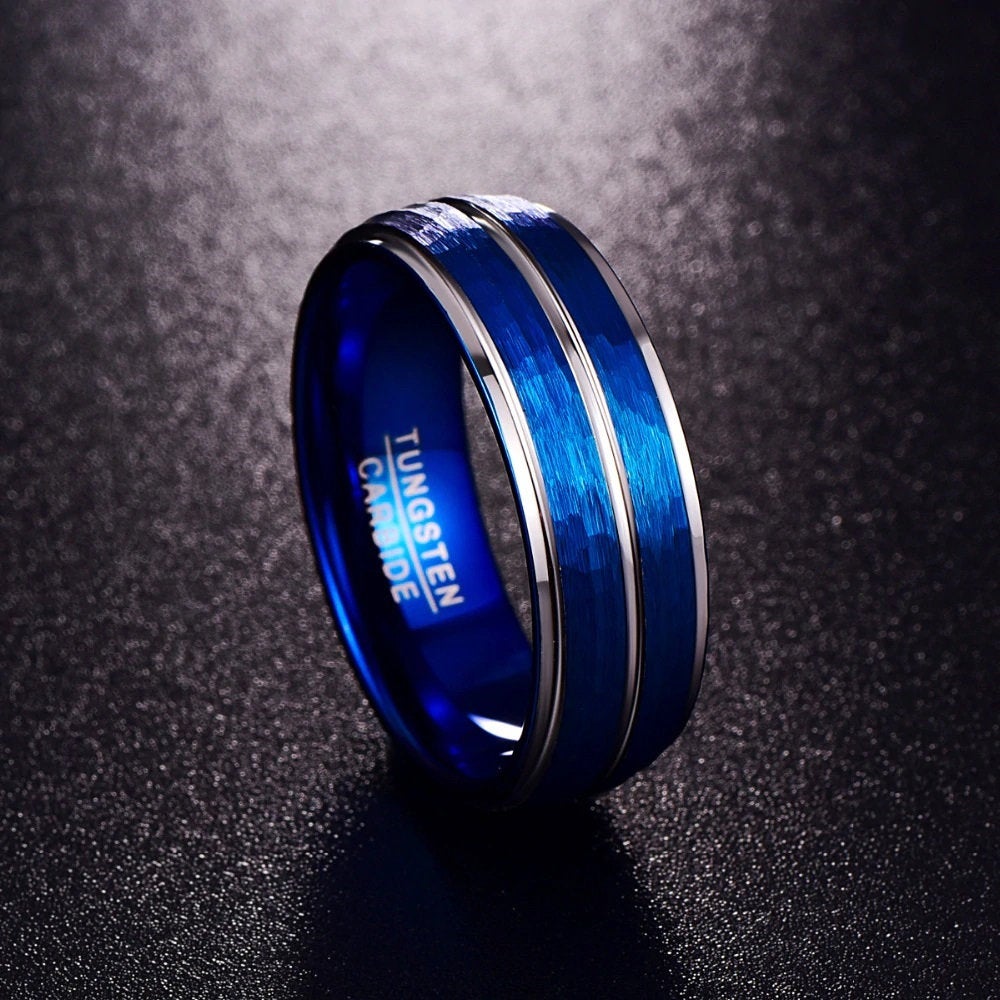 Blue and silver ring featuring blue Tungsten band with silver stepped edges.