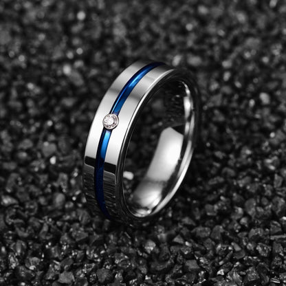 Blue and silver wedding bands in polished silver Tungsten with blue stripe and cubic zirconia.