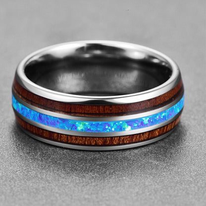 Blue fire opal inlaid in a silver Tungsten ring with Mahogany wood accents.