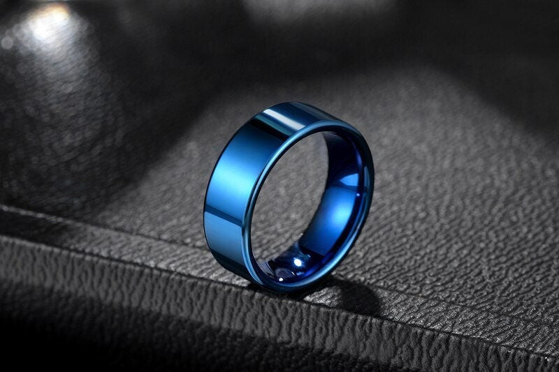 Blue mens ring crafted from vibrant blue Tungsten for a bold look.