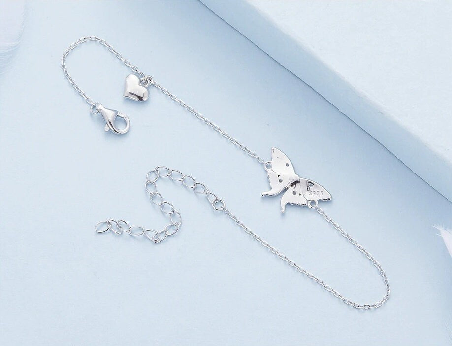 Back side of matching bracelet, showing the sterling silver stamp.