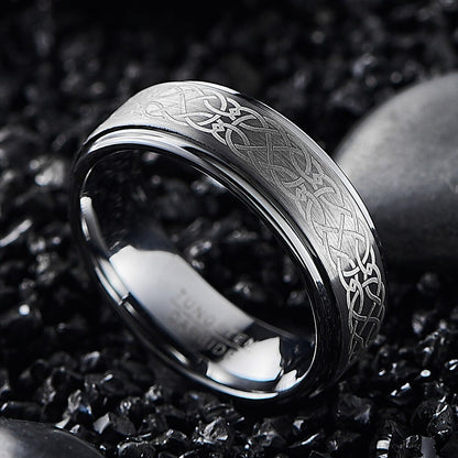 Celtic design wedding rings in silver Tungsten with stepped edges and comfort fit.