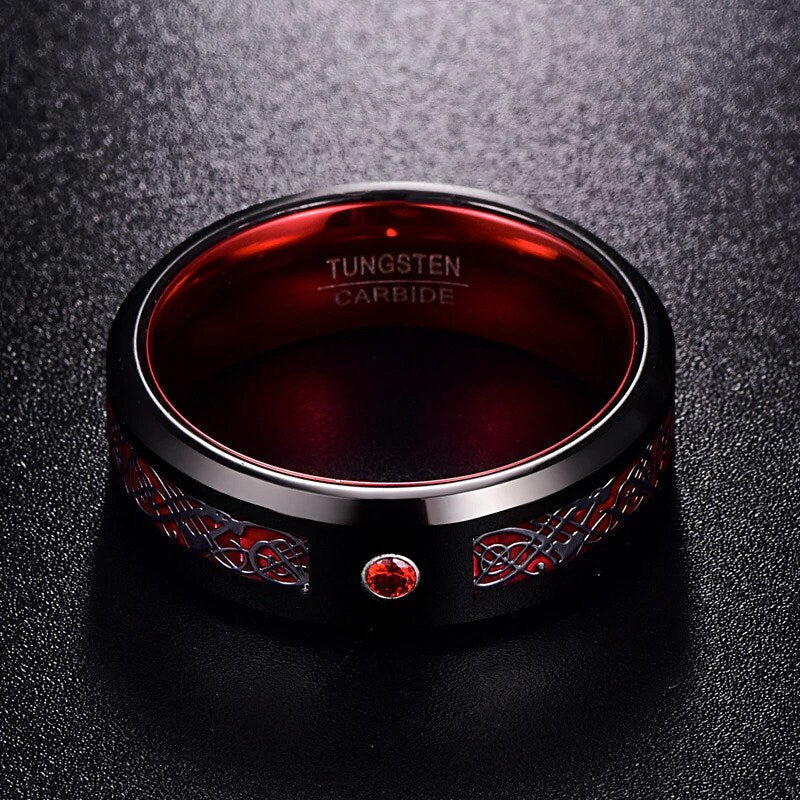 Celtic dragon ring in black Tungsten with red interior and cubic zirconia stone.