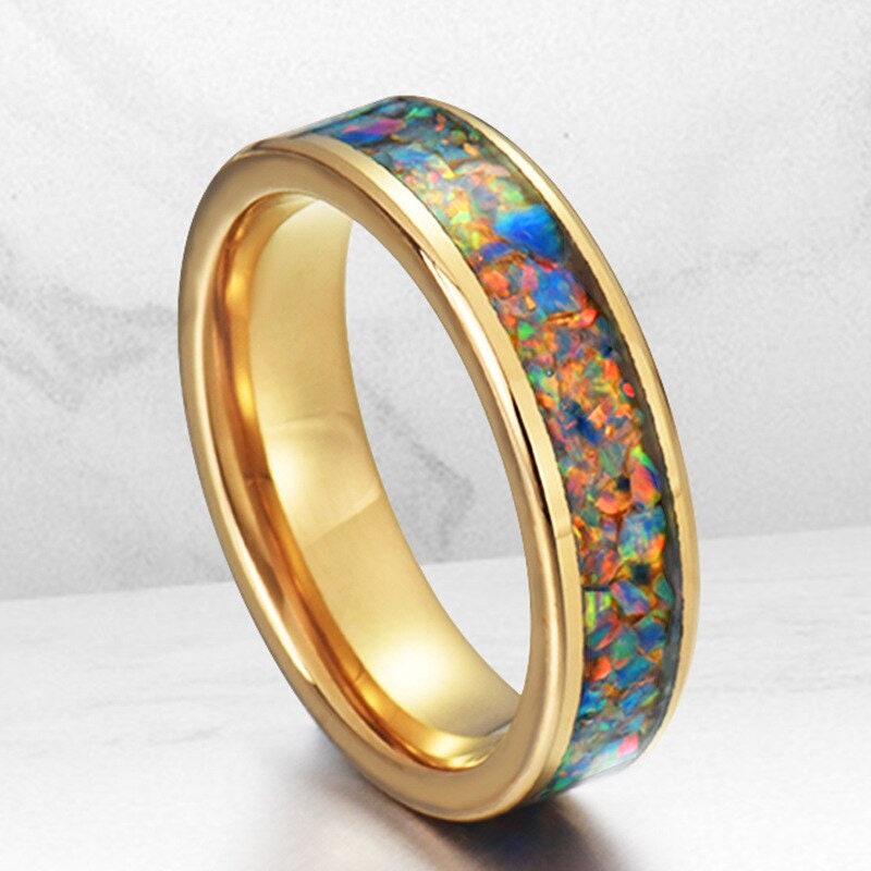 Cheap opal rings with gold Tungsten flat band and shimmering opal inlay.