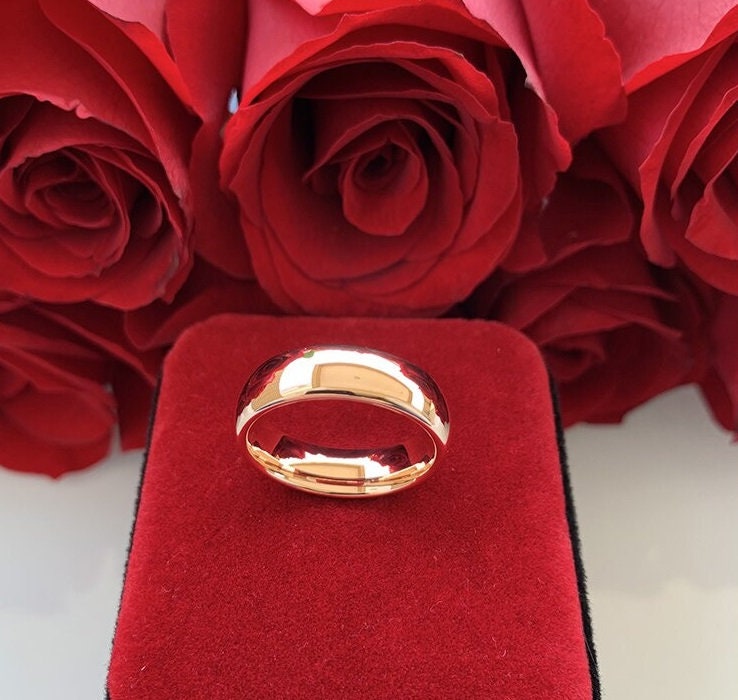 Domed rose gold 6mm ring with a polished finish and comfort fit design.