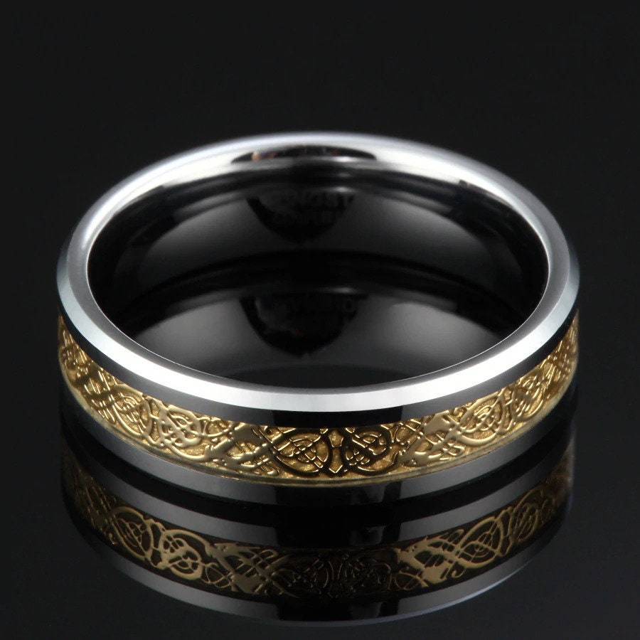 Dragon Celtic ring showcasing gold inlay and silver Tungsten band.