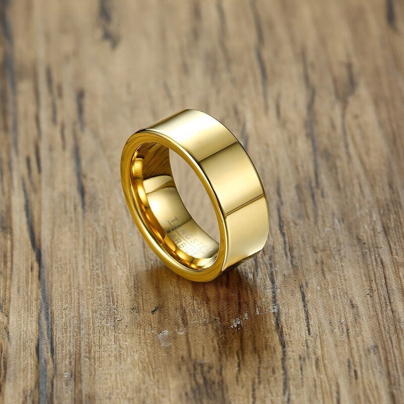 Flat wedding band in gold Tungsten with a smooth comfort fit interior.