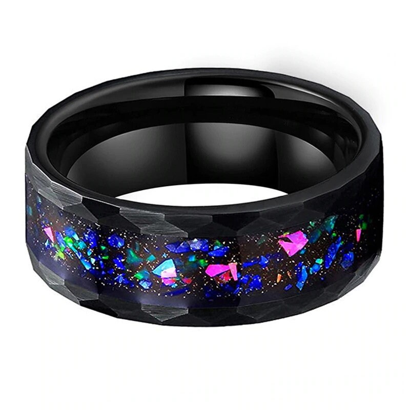 Galaxy inspired rings with hammered black Tungsten and opal gemstone inlay.