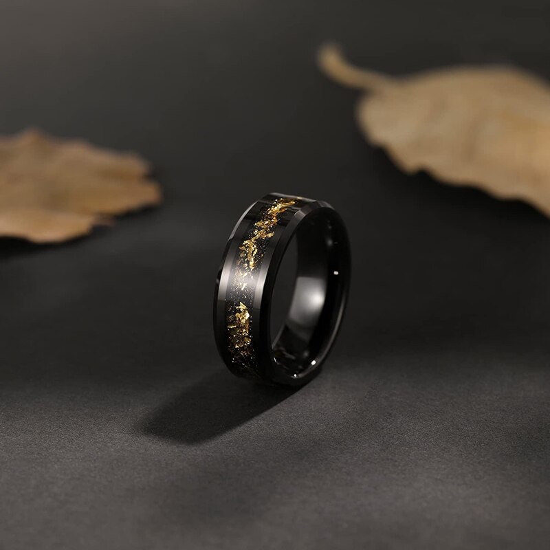 Black Tungsten gold flake ring with 24k gold leaf inlay over black sandstone, 8mm flat profile, comfort fit.