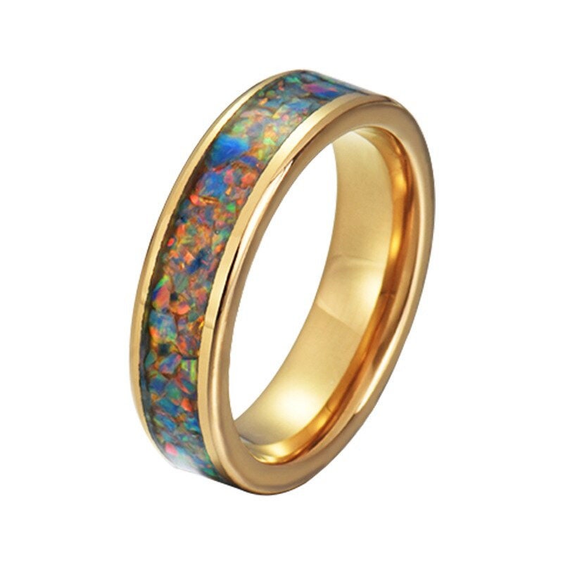 Gold opal wedding band featuring a unique design with colorful opal inlay.