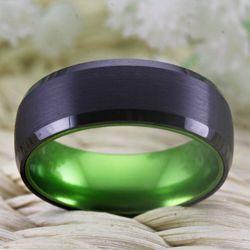 Green black ring men featuring a black Tungsten band and vibrant green interior.