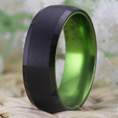 Green wedding band crafted from Tungsten with a polished green interior.