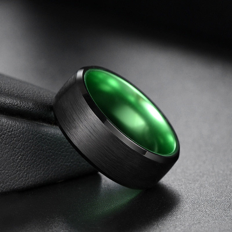 Green wedding rings for men with black Tungsten band and bold green interior.