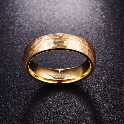 Hammered gold wedding ring featuring a Tungsten band and comfort fit design.