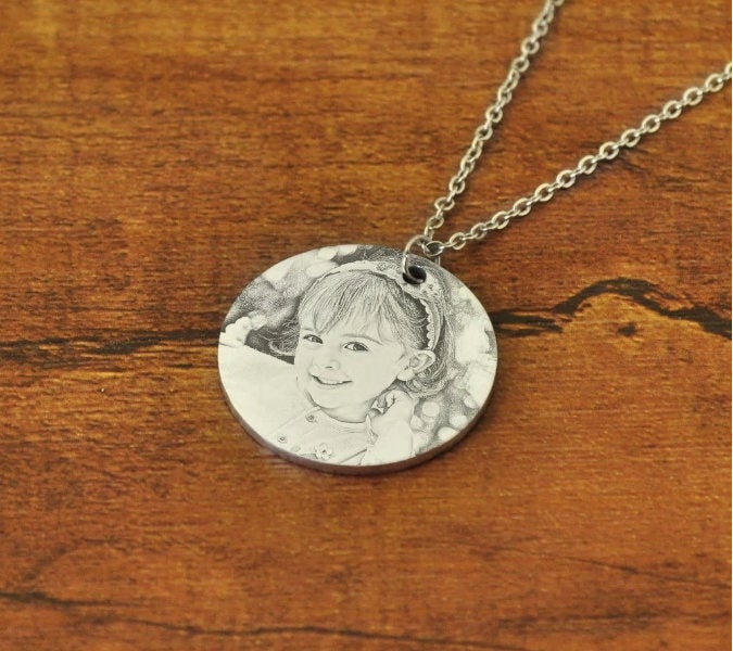 Pendentif photo coeur en argent gravé sur mesure