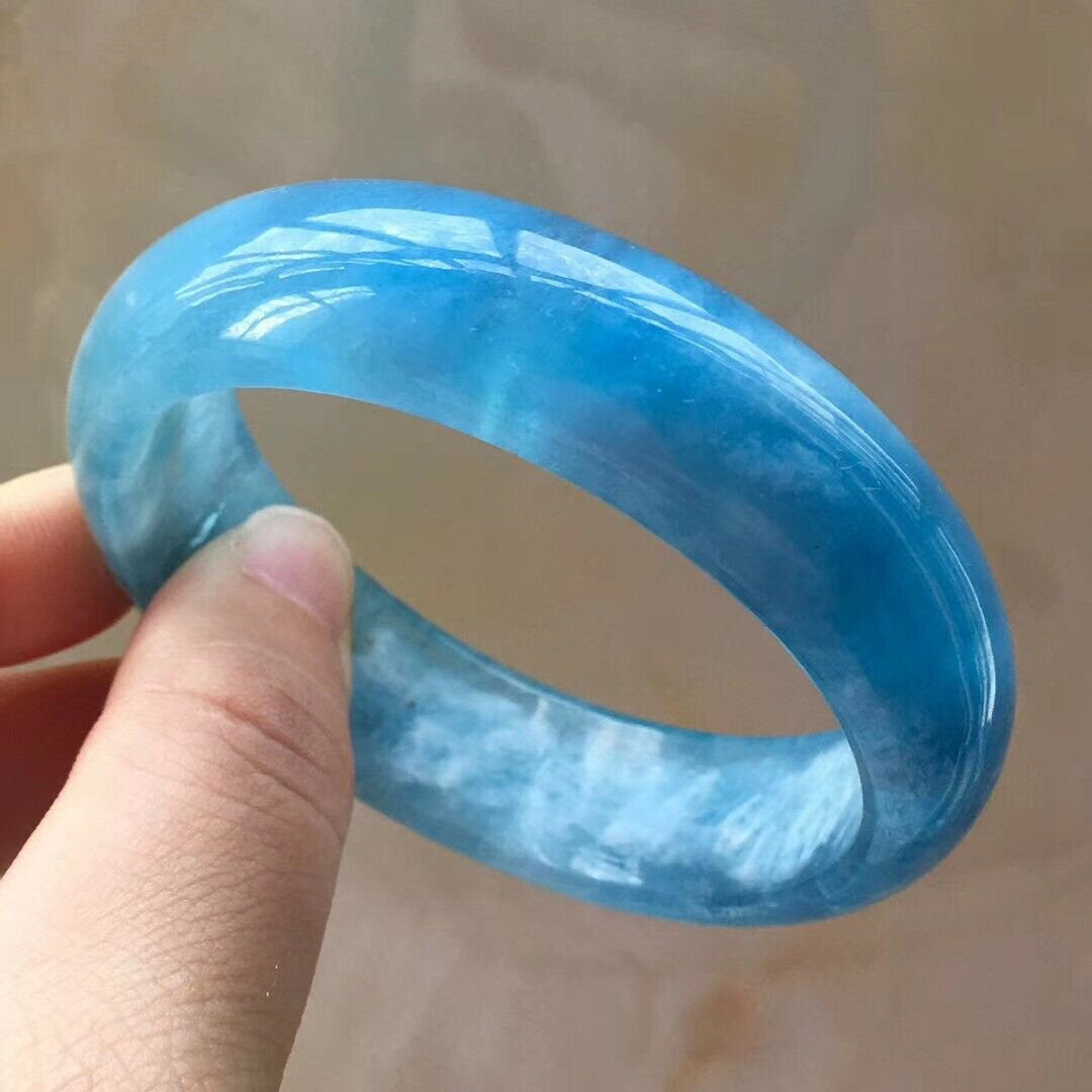 Bracelet jonc avec pierres précieuses aigue-marine bleue