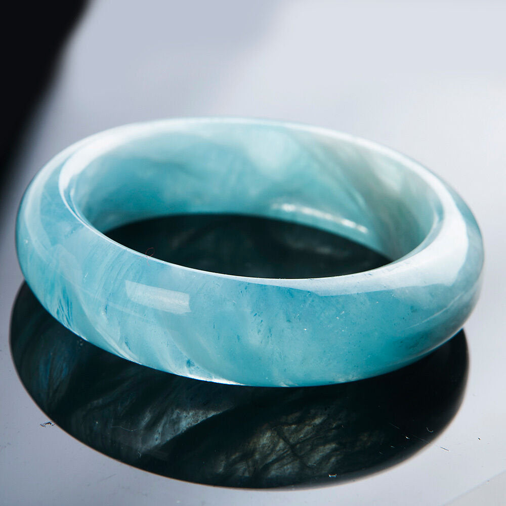 Bracelet jonc avec pierres précieuses aigue-marine bleue