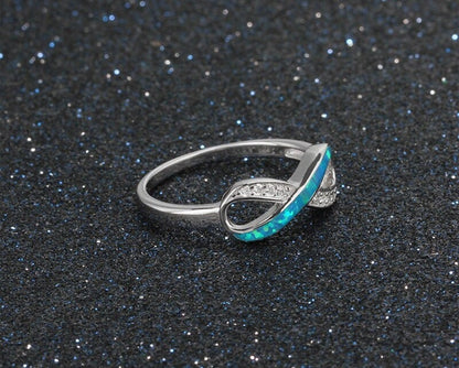 Bague infini en argent sterling 925 avec opale bleue