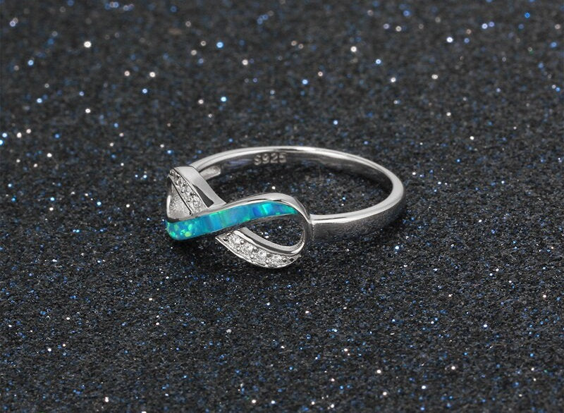 Bague infini en argent sterling 925 avec opale bleue