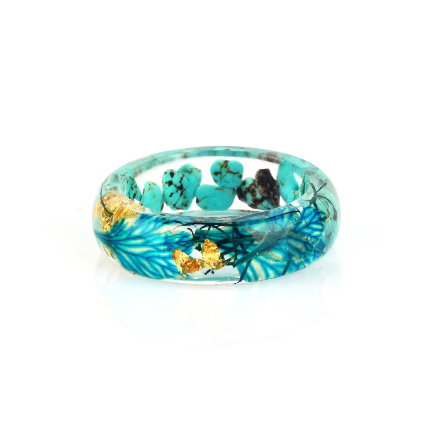 Botanischer Ring mit türkisen und blauen Blumen