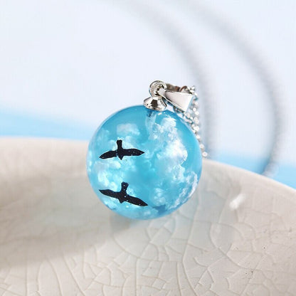 Pendentif oiseaux en plein essor