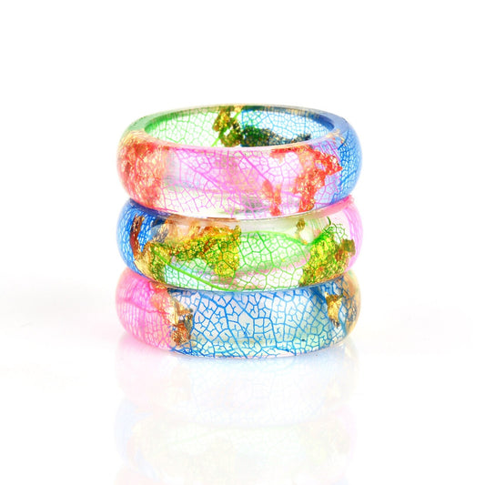 Bague squelette feuille arc-en-ciel