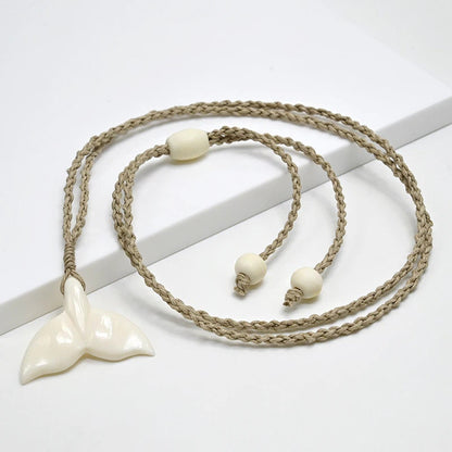 Whale Tail Carved Bone Pendant