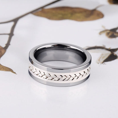 Knot ring mens band with a masculine flat design and white gold braided inlay.