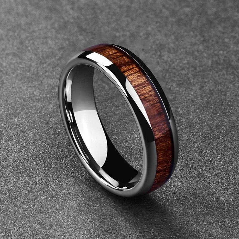 Silver Tungsten koa wood wedding band with a domed design.