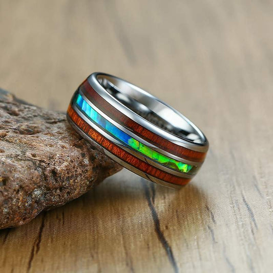 Koa wood wedding rings with abalone shell inlay, silver Tungsten band, comfort fit interior.