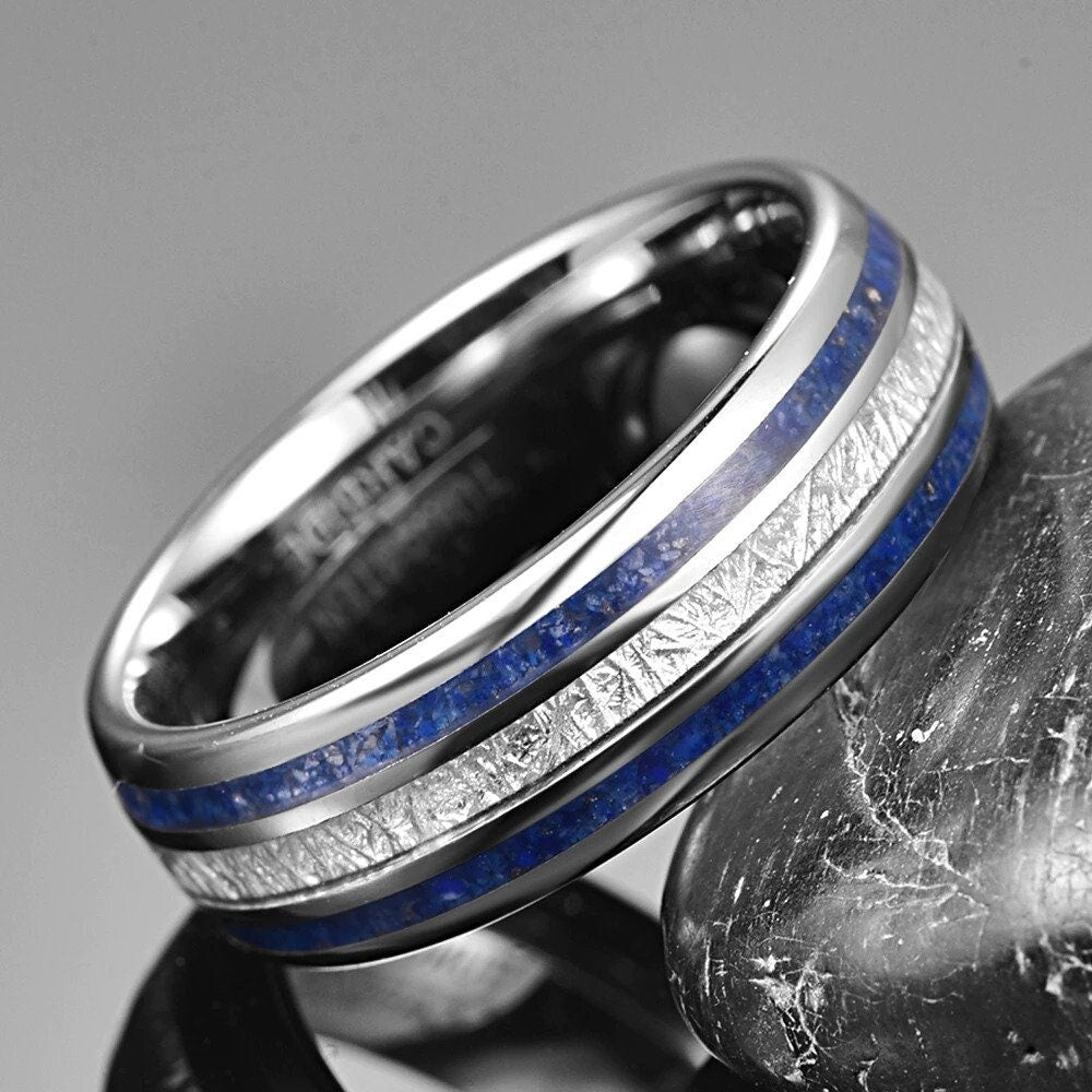 Men's Lapis rings with a silver Tungsten band inlaid with Lapis Lazuli and meteorite.