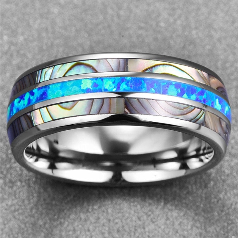 Mens wedding band with opal crafted from polished silver Tungsten.