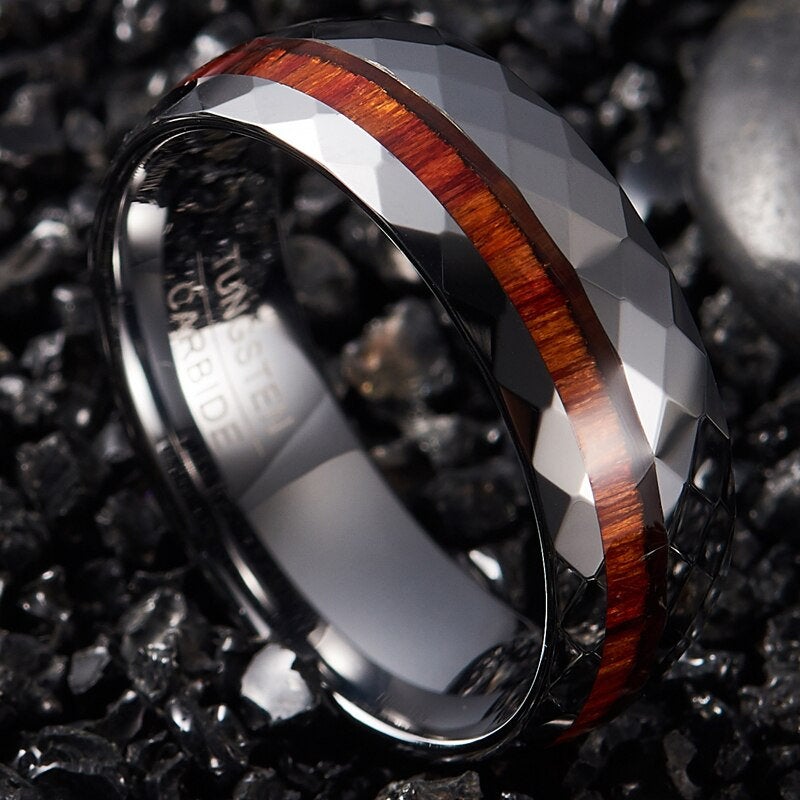 Mens wedding rings wood inlay featuring a faceted Tungsten band and Mahogany wood.