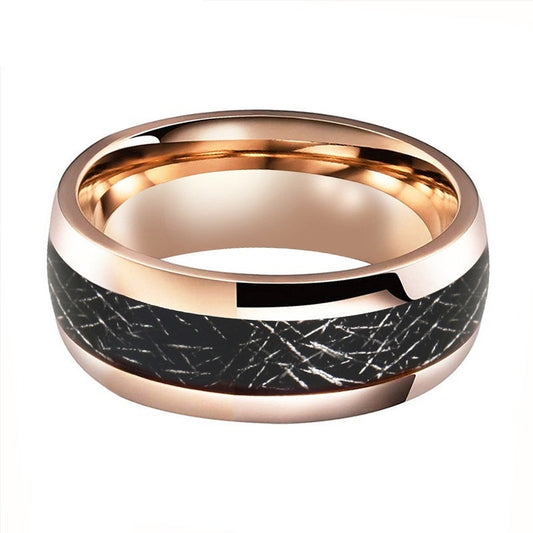 Meteorite wedding rings in rose gold Tungsten with a Gibeon meteorite inlay.