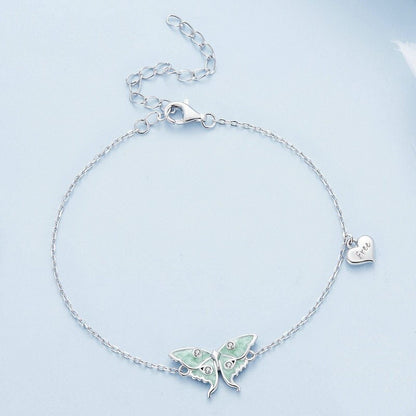 Moth bracelet featuring a pale green luna moth.