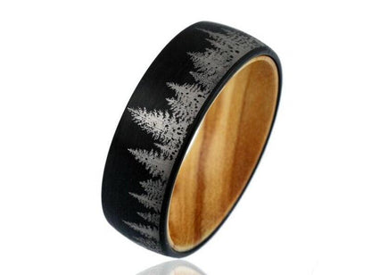 Nature inspired engagement rings in black Tungsten with natural pine wood interior.