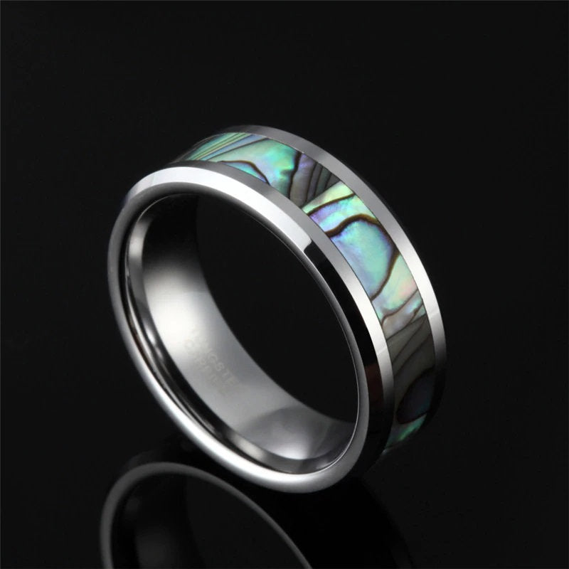 Ocean ring featuring a natural abalone shell inlay set in polished silver Tungsten.