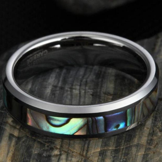 Ocean themed jewelry in a women’s Tungsten ring with abalone shell inlay.