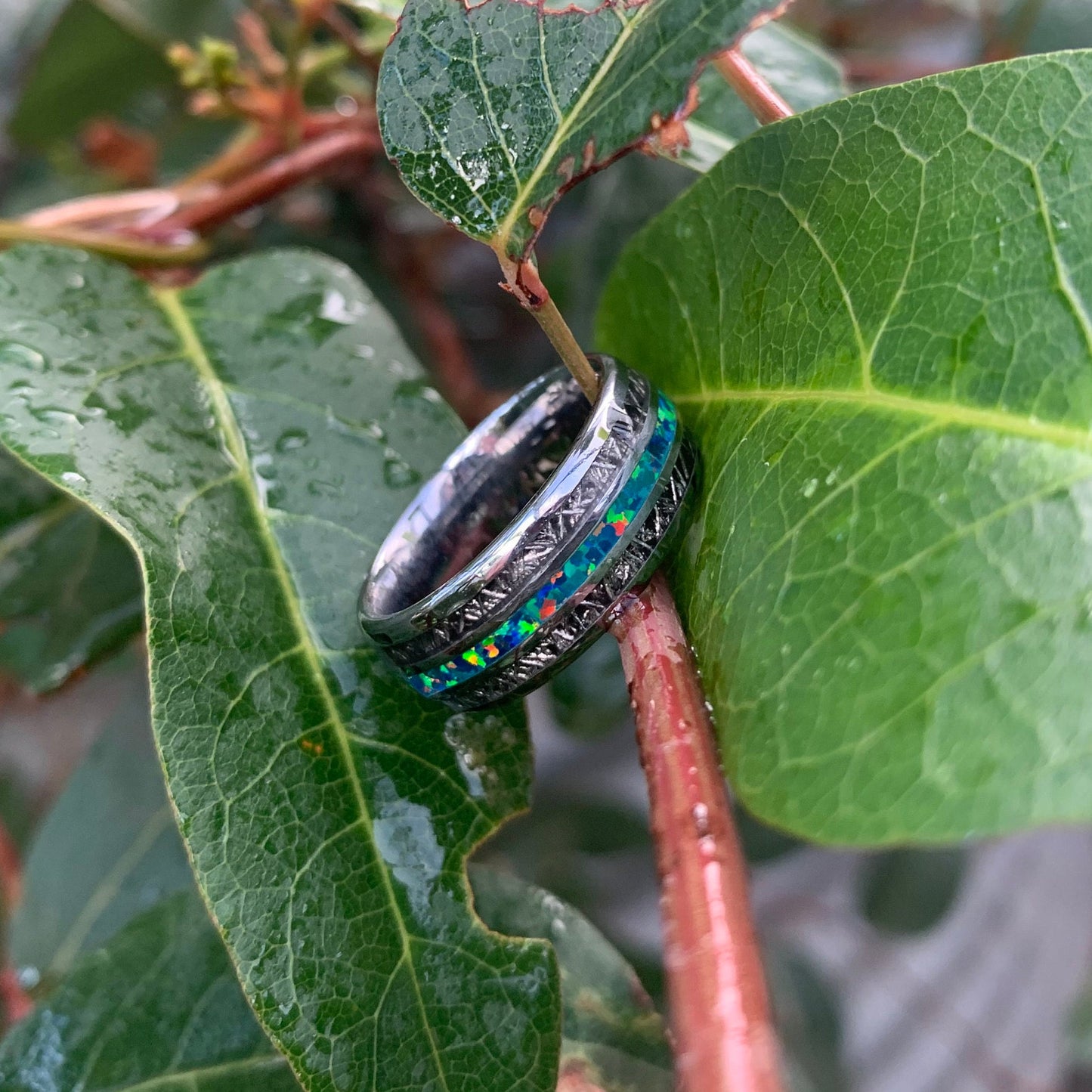 Opal wedding band mens in silver Tungsten, with Gibeon meteorite and opal inlay.