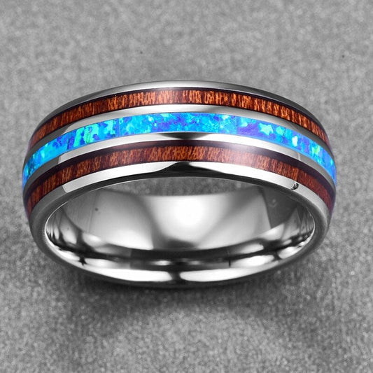 Opal wedding band in silver Tungsten with inlays of Mahogany wood and blue opal.