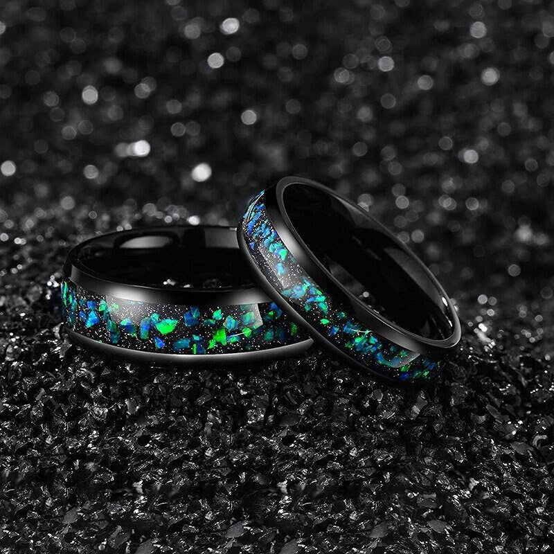 Opal wedding ring set with cosmic blue and green opal inlay in black Tungsten.